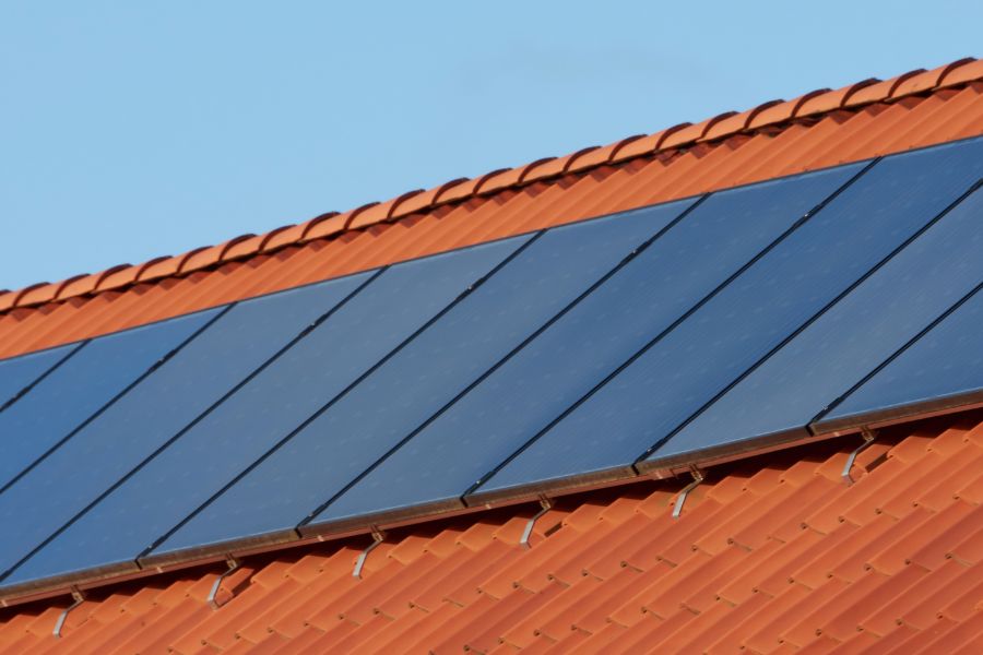 Flat plate solar thermal collectors on house roof